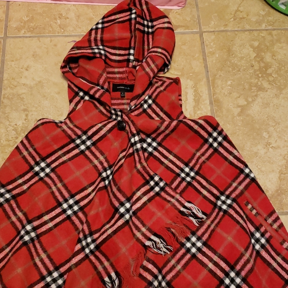 Red sleeveless flannel poncho